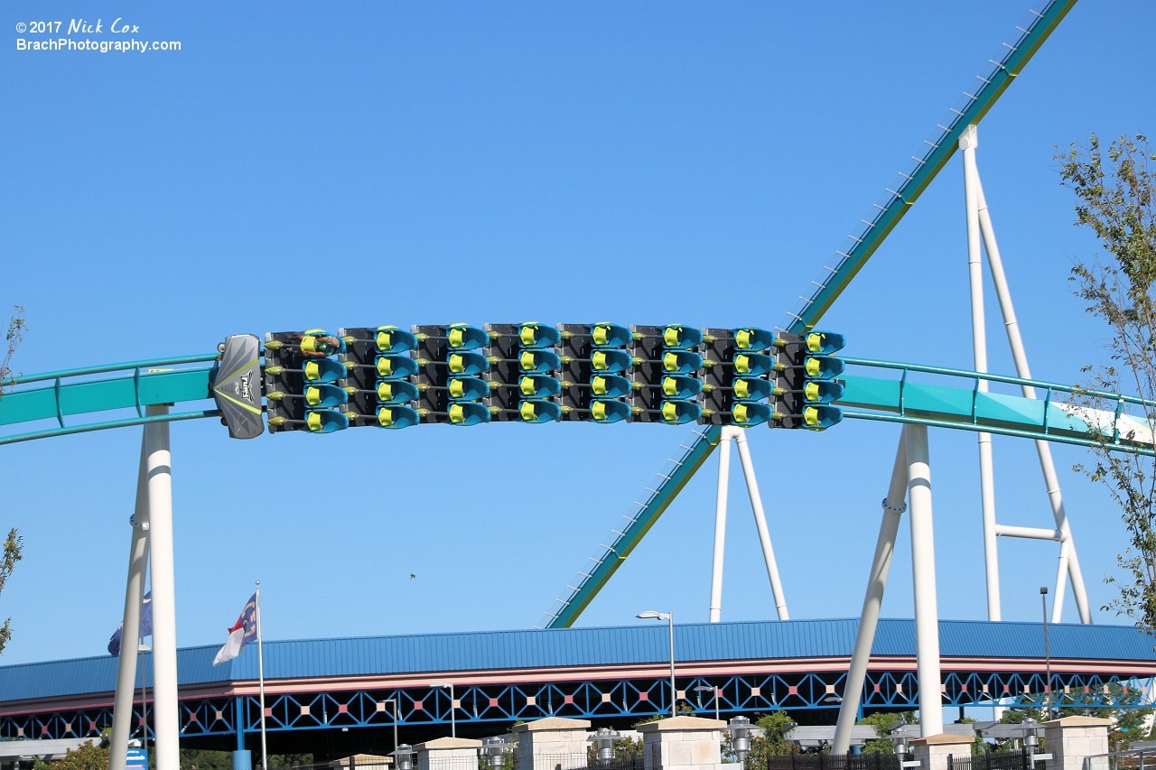 The coaster flying over the gate.