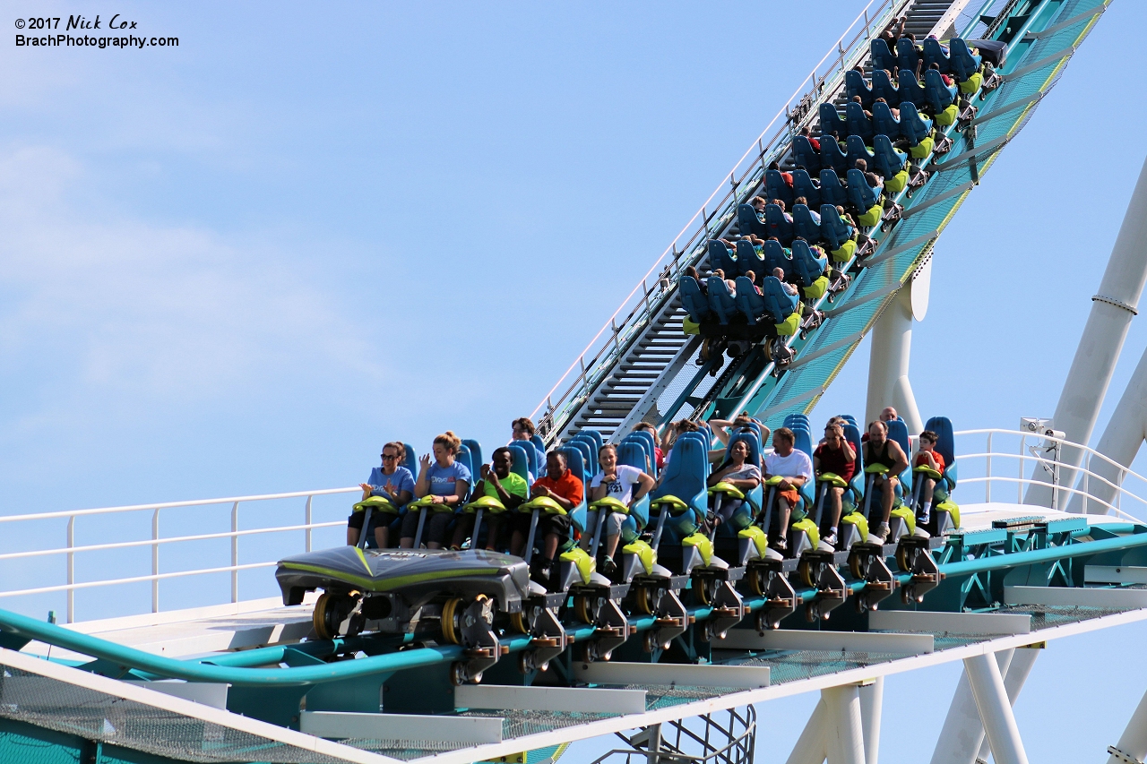 A train on the brake run with one on the lift.