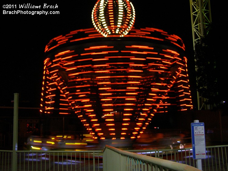 Apollo slowing down while lit up in orange lights.