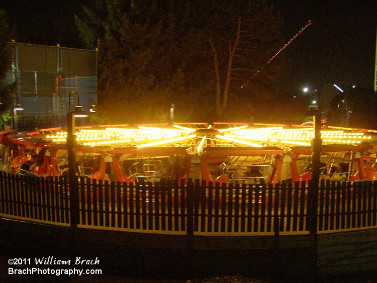 Ride loading up for the next run.  Lit up in yellow lights.