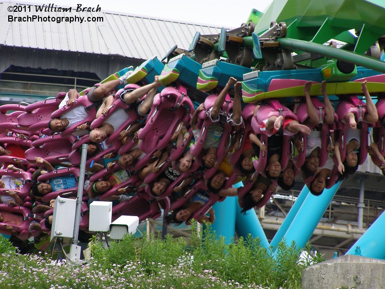 As the train departs the station, it slowly navigates a hearline roll which is known as a "Jojo Roll" before it even reaches the lift hill.  This is also where the first of two onboard photos are taken of the riders.