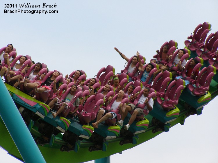 Riders enjoying the thrill of riding a floorless coaster!