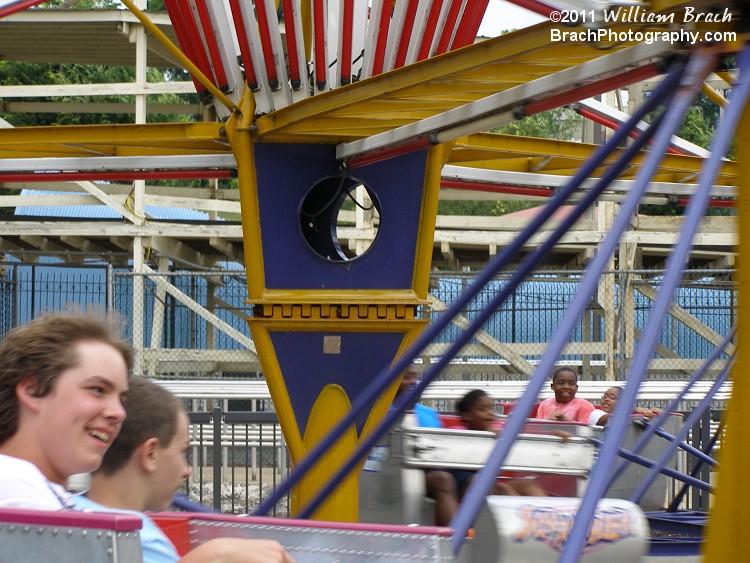 Closeup view of the ride's colors and lights.  Wish I had seen this one lit up - Looks to be quite impressive with red and white lights.