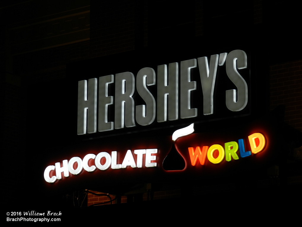 Hershey's Chocolate World Entrance sign at night.