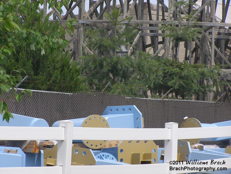 Skyrush supports lined up outside the park next to Lightning Racer.