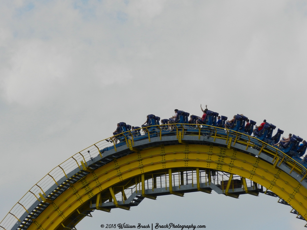 Skyrush train cresting the top of the lift hill.