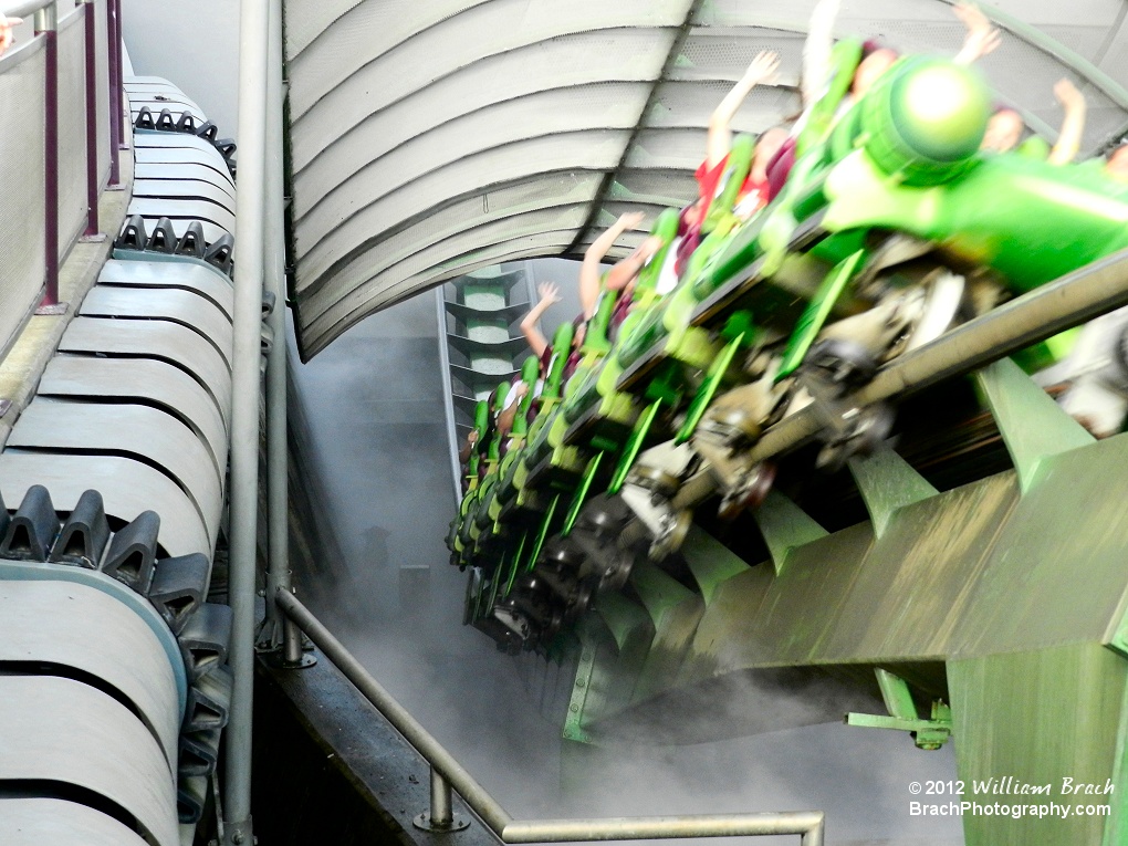 Train treveling through the mist tunnel.