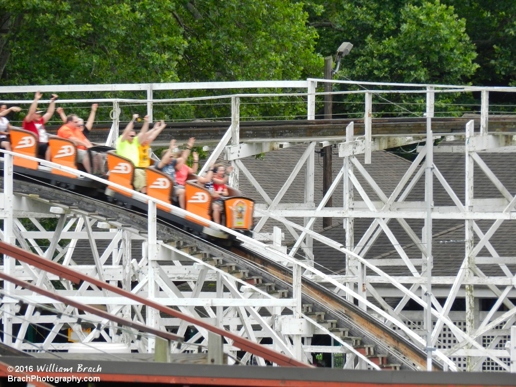 The orange train of Jack Rabbit running the course.