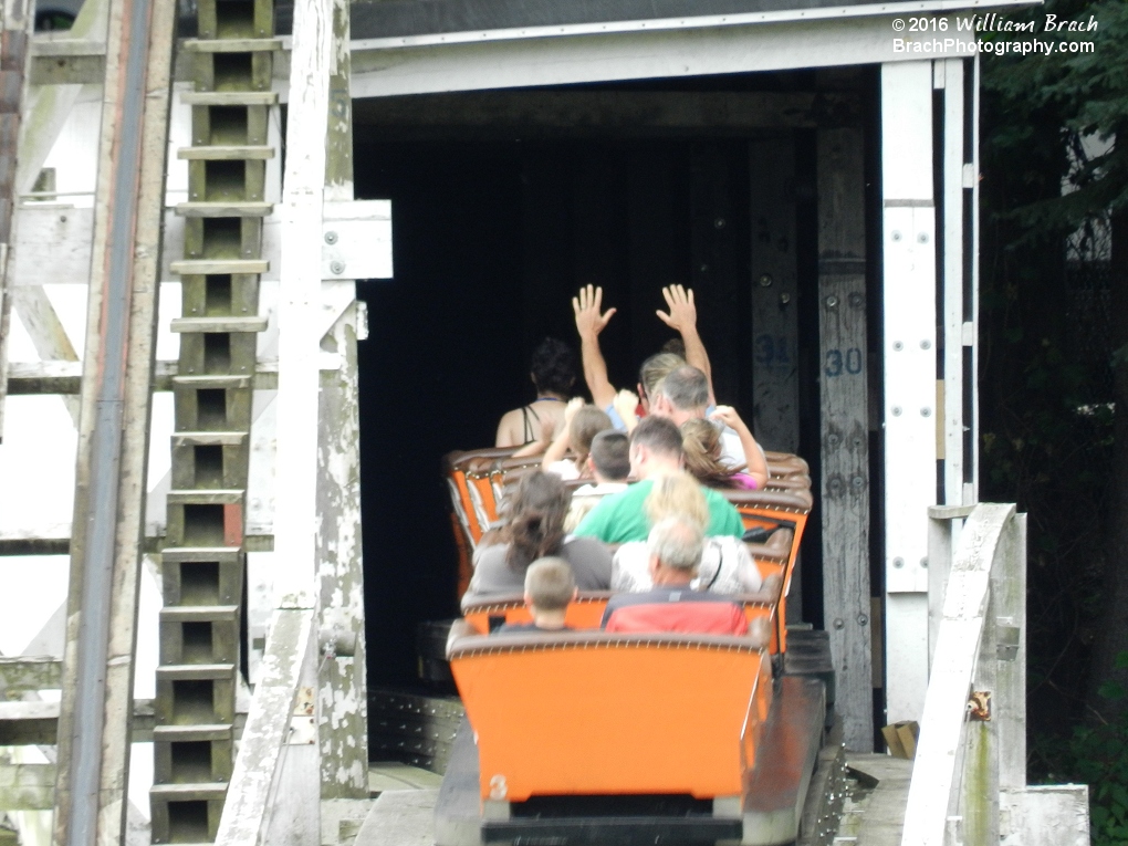 Orange train entering the turnaround tunnel.