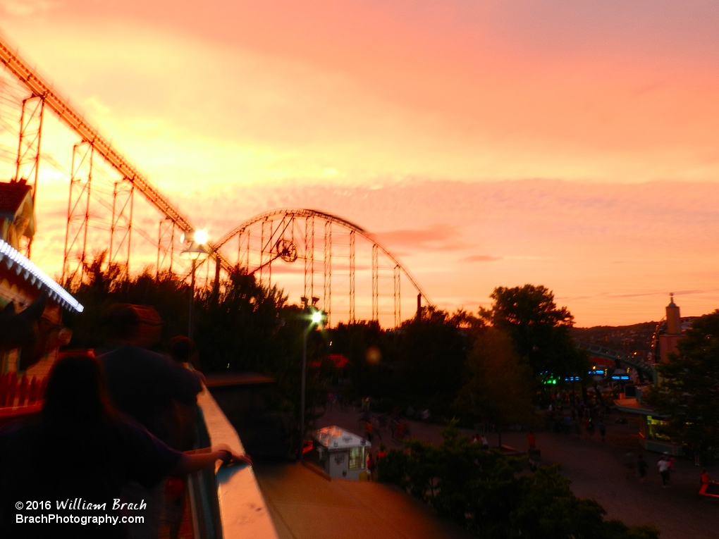 Beautiful sunset at Kennywood.  Imagine how much better this photo would have been if it were crystal clear... Black Widow and Phantom's Revenge in action here.