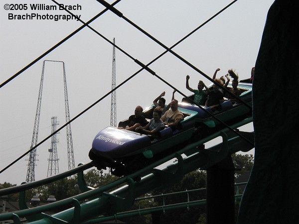 Phantom's Revenge has two trains.  Both feature the same colors, but in different schemeds.  Here we see the the purple train running the course.