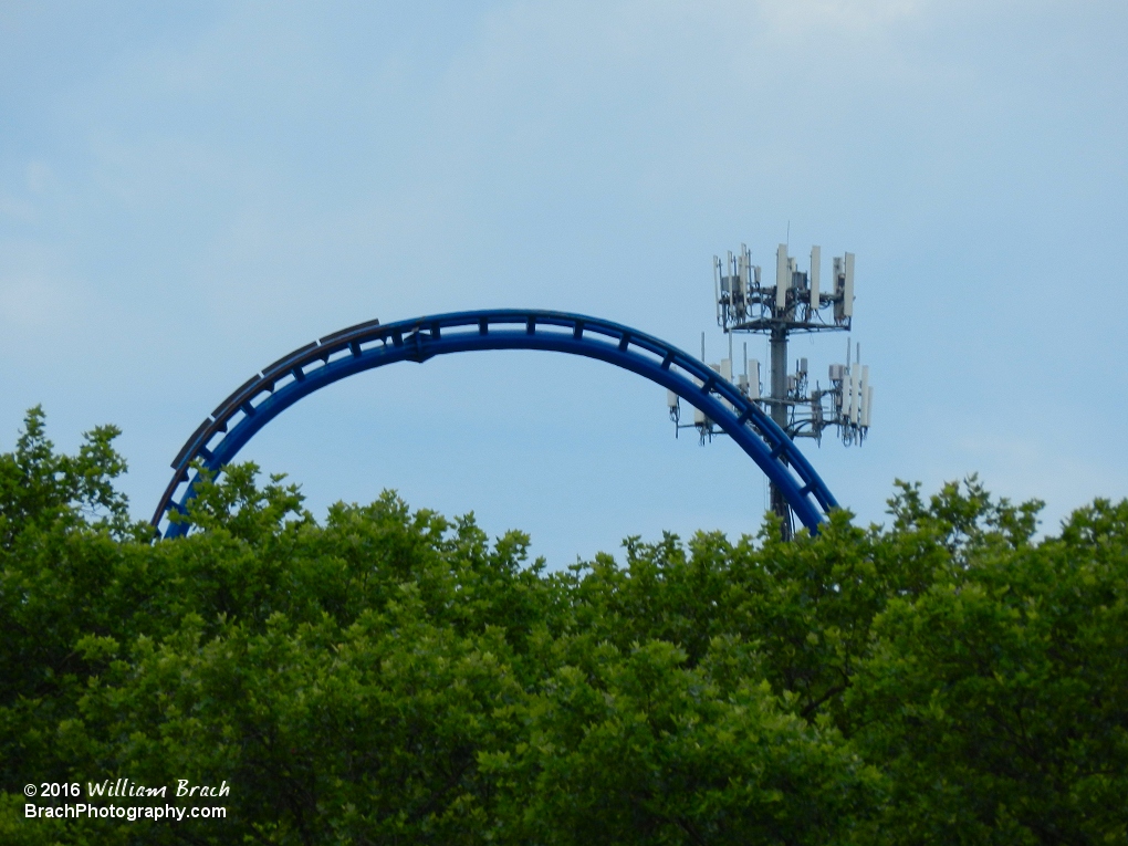 Just over the treeline is the top of the launch hill of Sky Rocket.  Those are brake fins to slow down the train before you go down the hill.