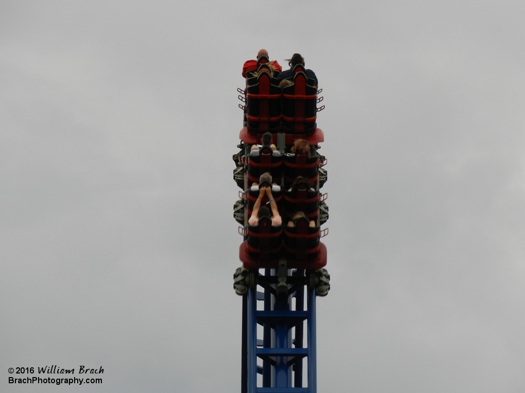 Train cresting the top of the hill.