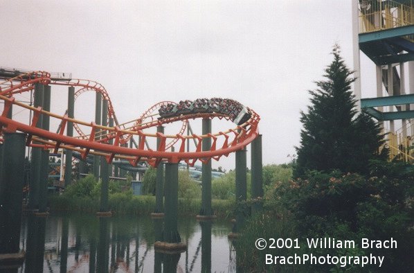 Fresh coat of green, orange and yellow paint - the train is making its way through the twisty turns.