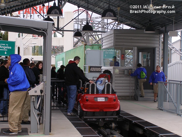 Backlot Stunt Coaster train loading up with peeps.