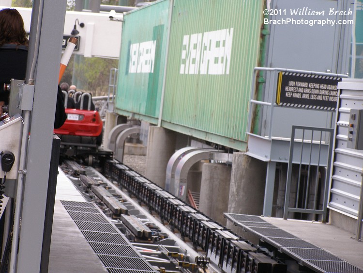 Train speeding at only 40mph down the straightaway and about to enter the upward helix in the parking garage.