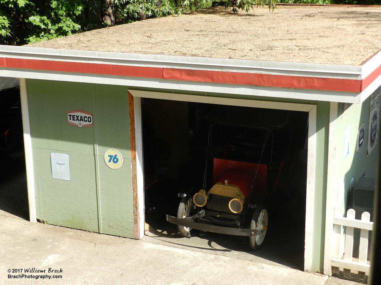 Blue Ridge Tollway garage with a red car inside.