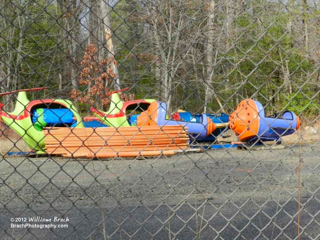 Former Kidzville ride, Space Port, sits in the park's boneyard awaiting its fate.