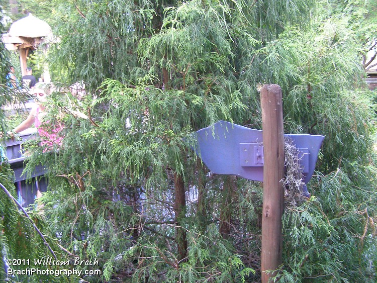 I think the plants have overgrown a bit there.  You can't see this sign anymore!