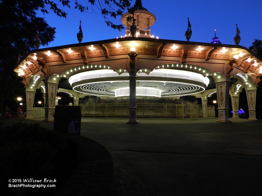 Carousel lit up at night.