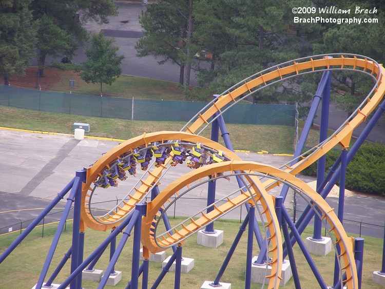 Dominator train making its way through the corkscrew elements.