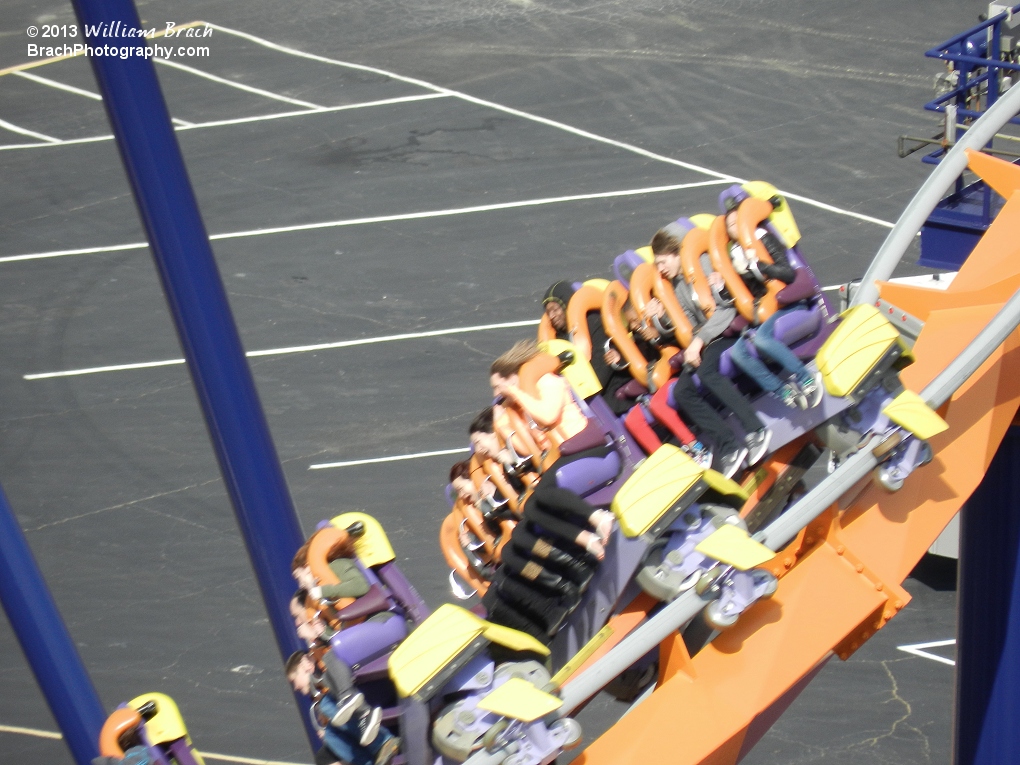 Train leaving the lift hill and pulling the last few rows with it!