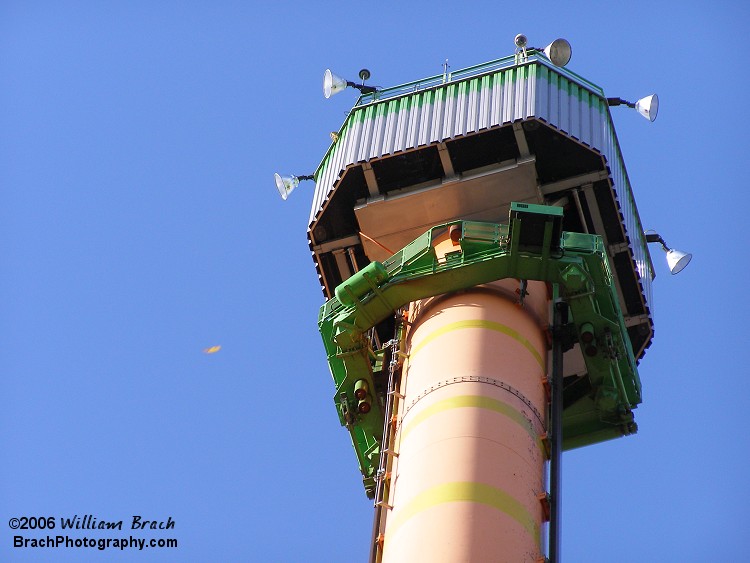 Looking up at the top of the tower.  Notice there's a security camera next to one of the floodlights?