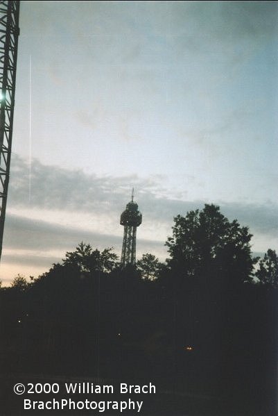 Eiffel Tower in the distance at dusk.