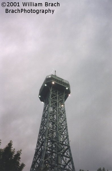 Eiffel Tower at dusk on a cloudy day/