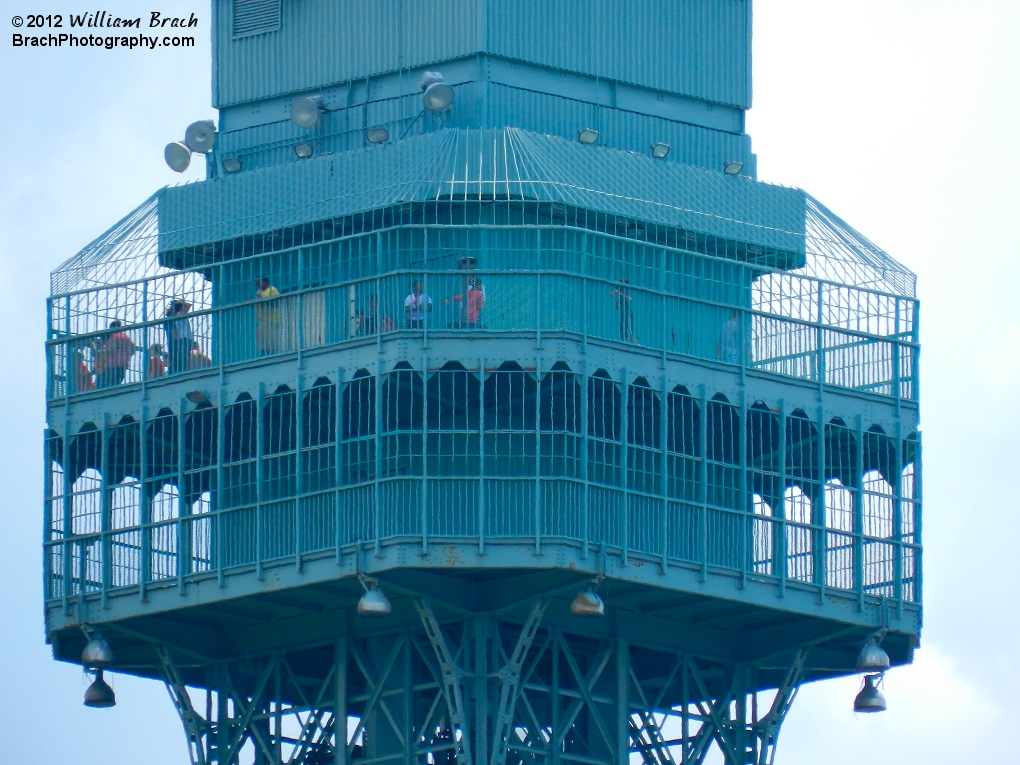 Guests checking out the views from the top deck of the Eiffel Tower.