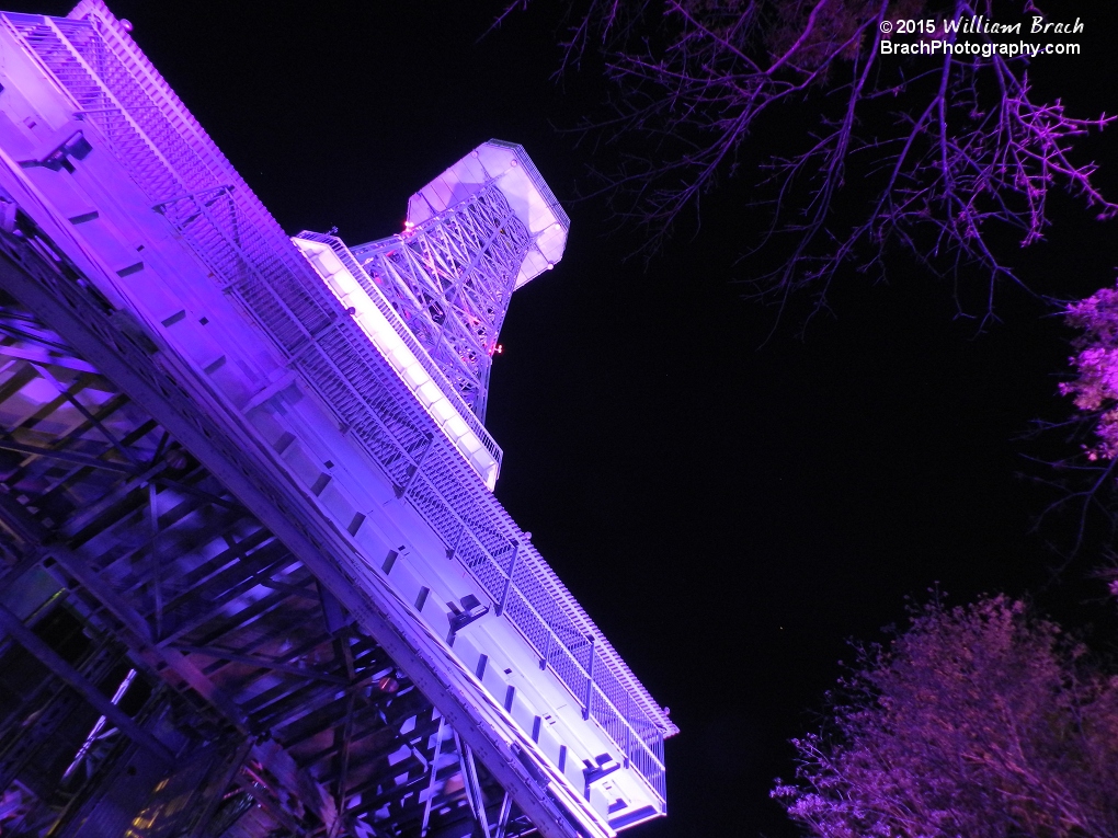 Purple lights on the Eiffel Tower at night.