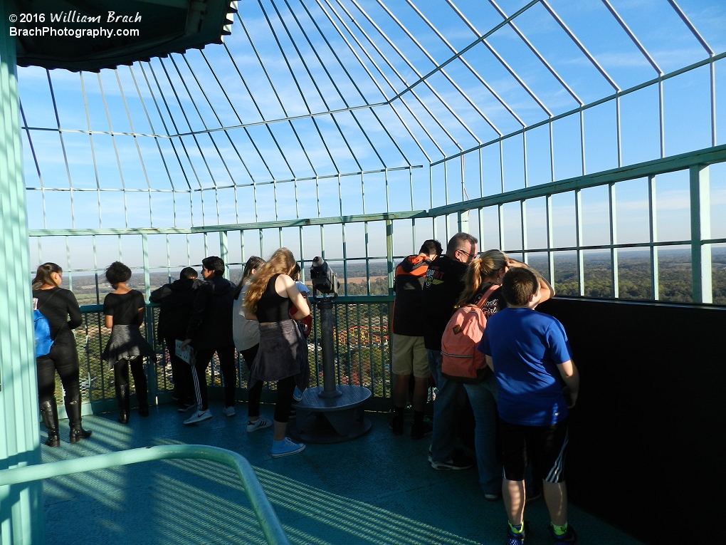 Enjoying the view from the top deck of the Eiffel Tower.