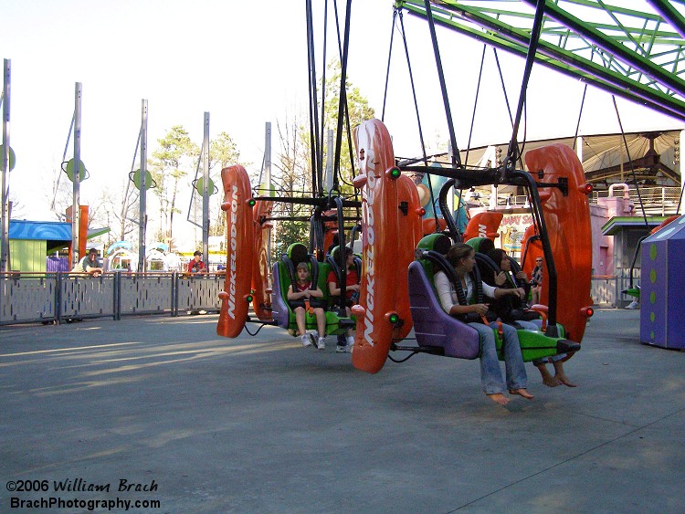 Riders awaiting their turn to go flying on the Flying Ace.