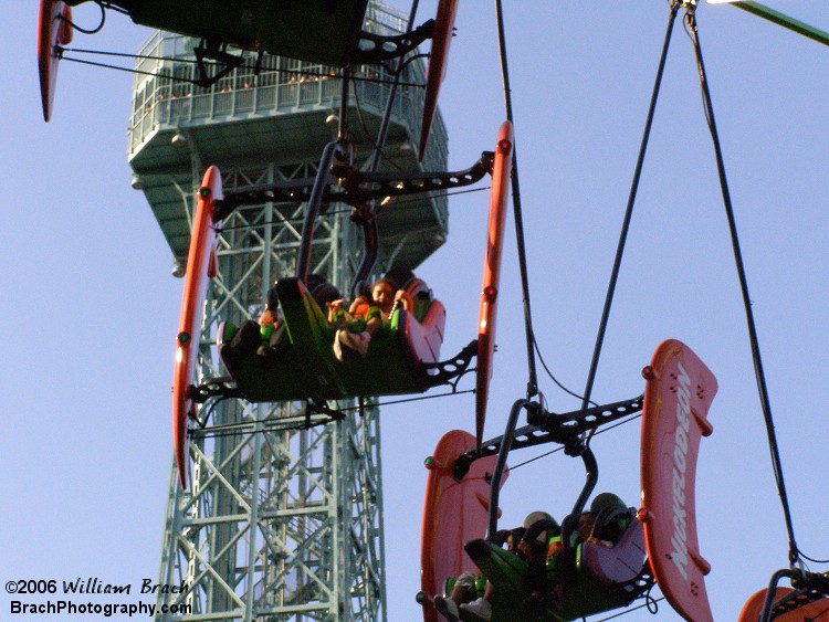 Flying Ace going up into the air before the ride starts spinning.