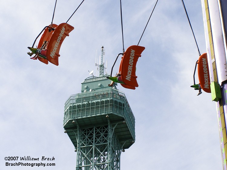 The Eiffel Tower is seen behind the Flying Ace.