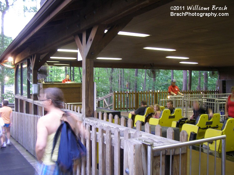 Yellow train in the station.