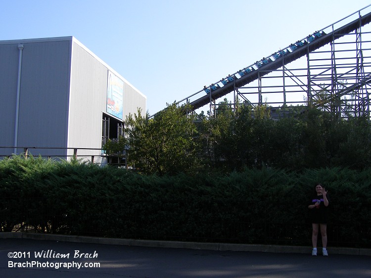 Hurler train going up the lift hill.  That's Laura showing off her engagement ring a short while after I proposed to her on the Eiffel Tower observation deck that day.  We're getting married in October 2012.  2020 Update: Still happily married to her.