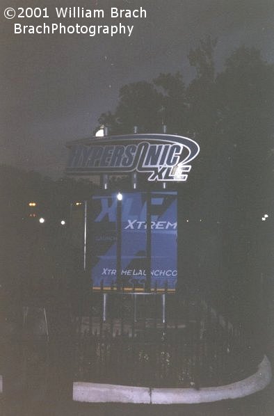 Entrance sign to HyperSonic XLC at night.