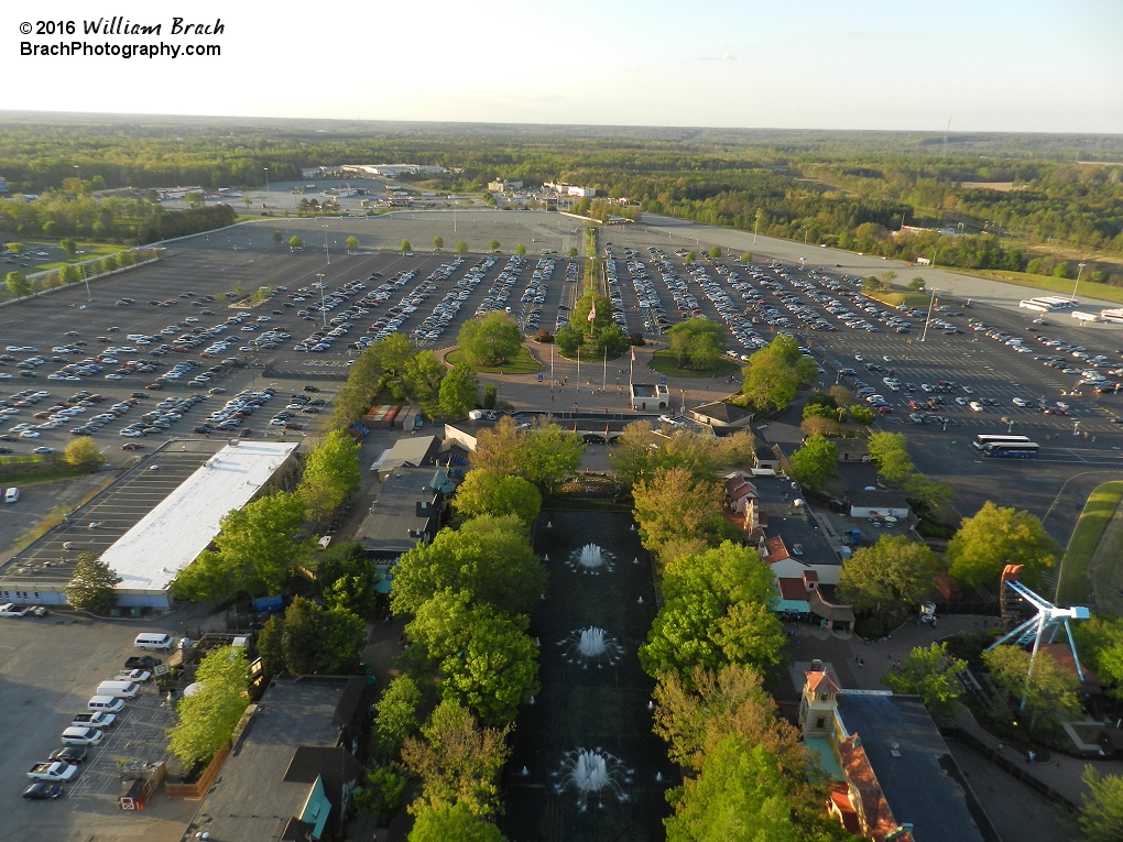 Front of the park with International Street, the front gate and the parking lot.