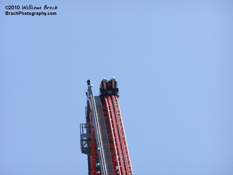 Silver train cresting the lift.