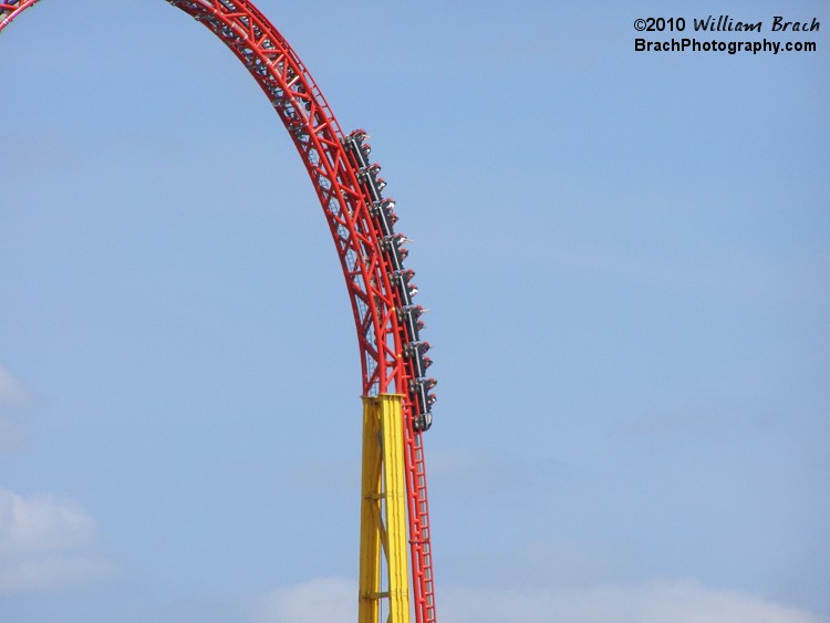 Look closely at the track here.  Trim brakes were added to the first drop shortly after the ride opened. This was due to the excessive stress/wear/tear on the coaster wheels and an attempt to reduce the number of black/grayouts experienced by non-seasoned coaster nuts.  These trim brakes were removed for the 2011 season after the ride was reprofiled.