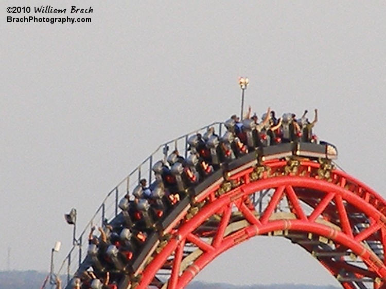 Silver train cresting the lift hill on Intimidator 305.