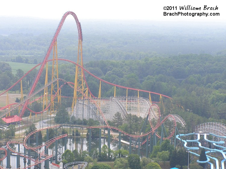 The 2011 season brought a major change in the ride's design - you can clearly see how the trakc has a better slope towards the second hill.  This modification was necessary to allow the trim brakes to come off the first drop and help reduce the number of people blacking out on the first turn.  It's a much better coaster with these modifications.