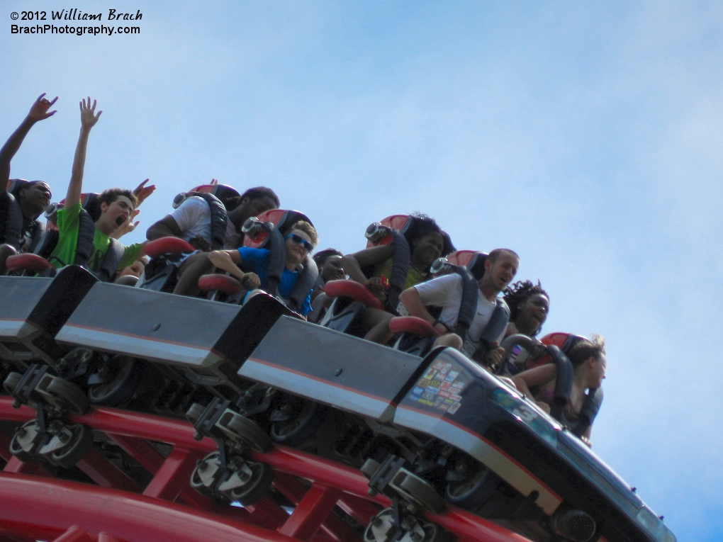 Close up of riders on the train.