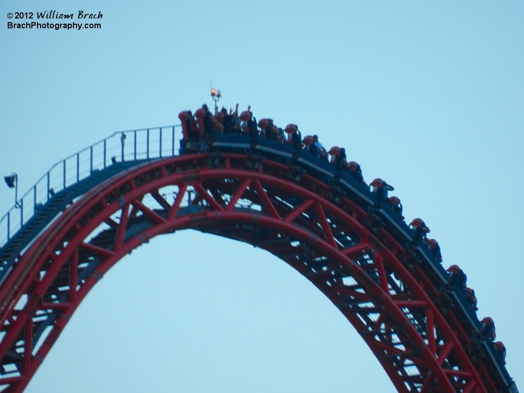 Train going over the 305-ft tall lift hill on Intimidator 305.