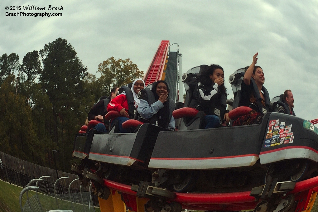 Happy riders returning to the station from the brake run on Intimidator 305 through the Fisheye lens.