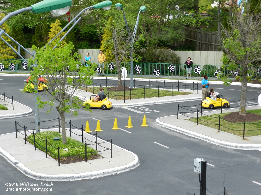 This attraction gives kids the chance to drive their own little car.