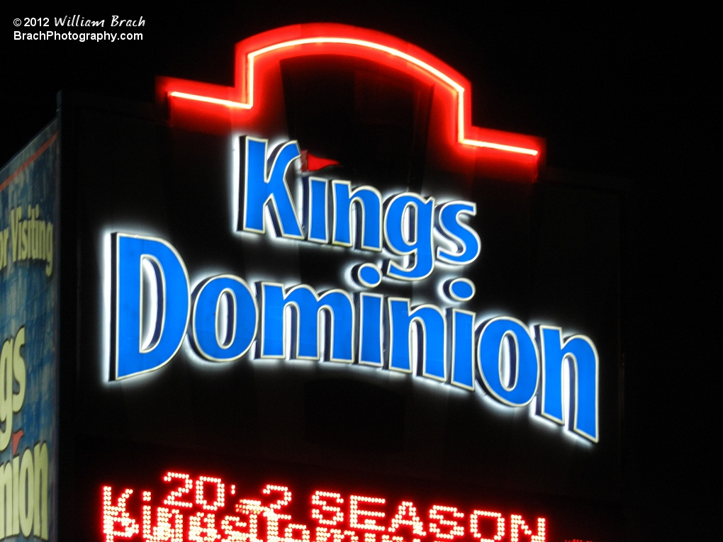 Some of the red neon border was not working, but this is the sign lit up at night on January 1, 2012.