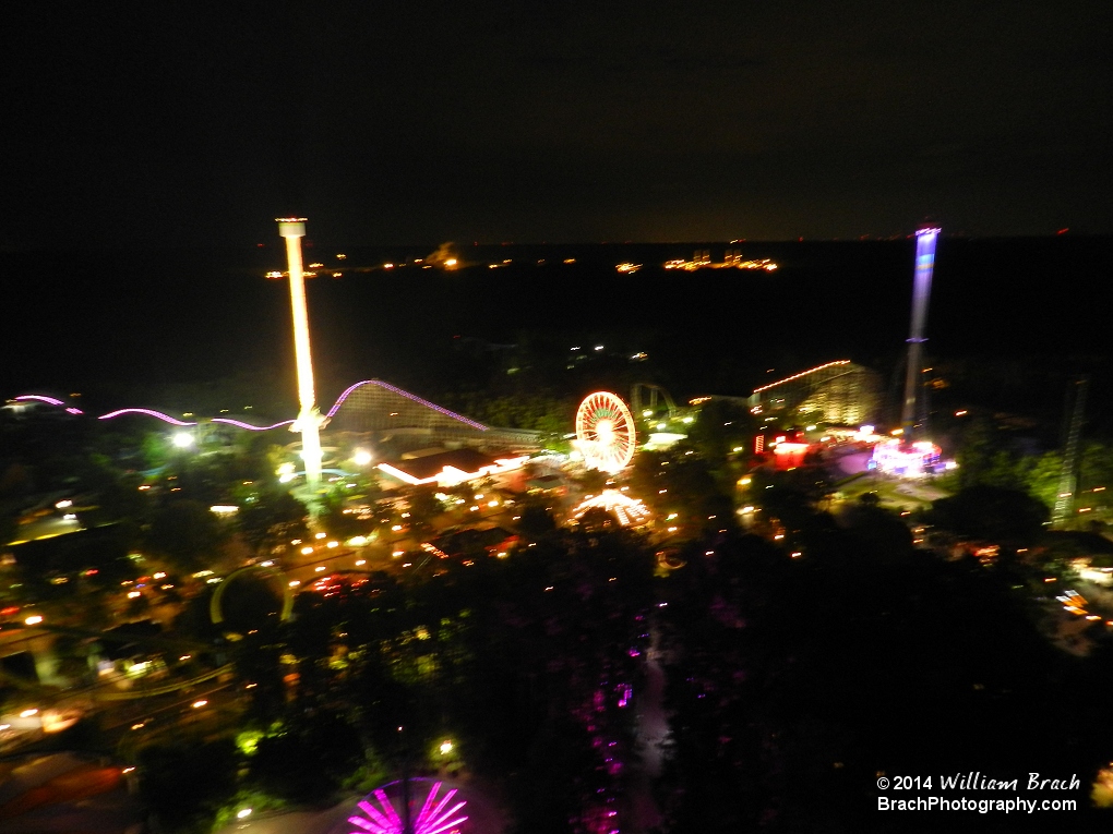 Views of the park at night from the top of the Eiffel Tower.