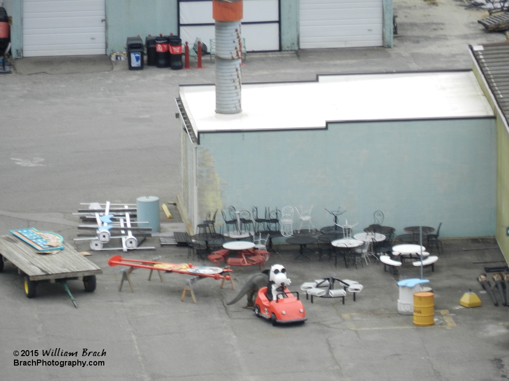 Broken tables, chairs, signs - is that snoopy trying to drive off with that red car?!